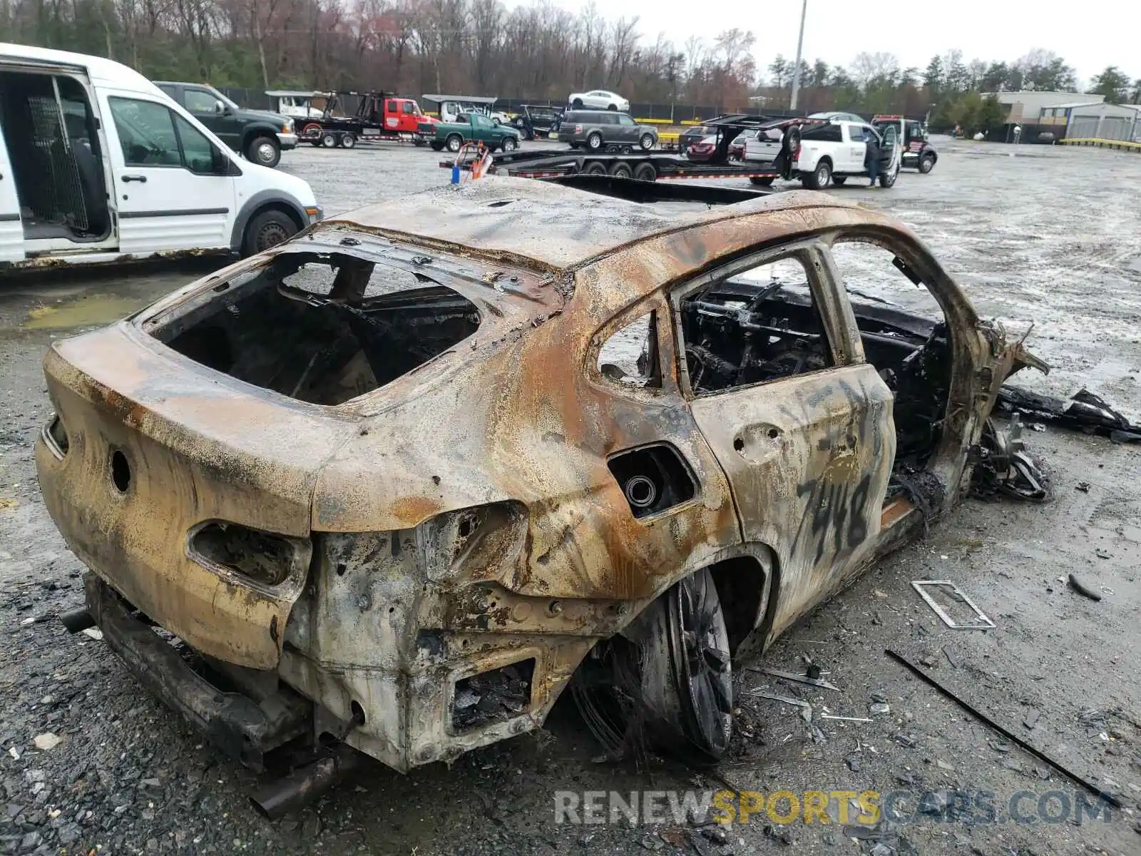 4 Photograph of a damaged car 5UX2V1C07L9B37448 BMW X4 2020