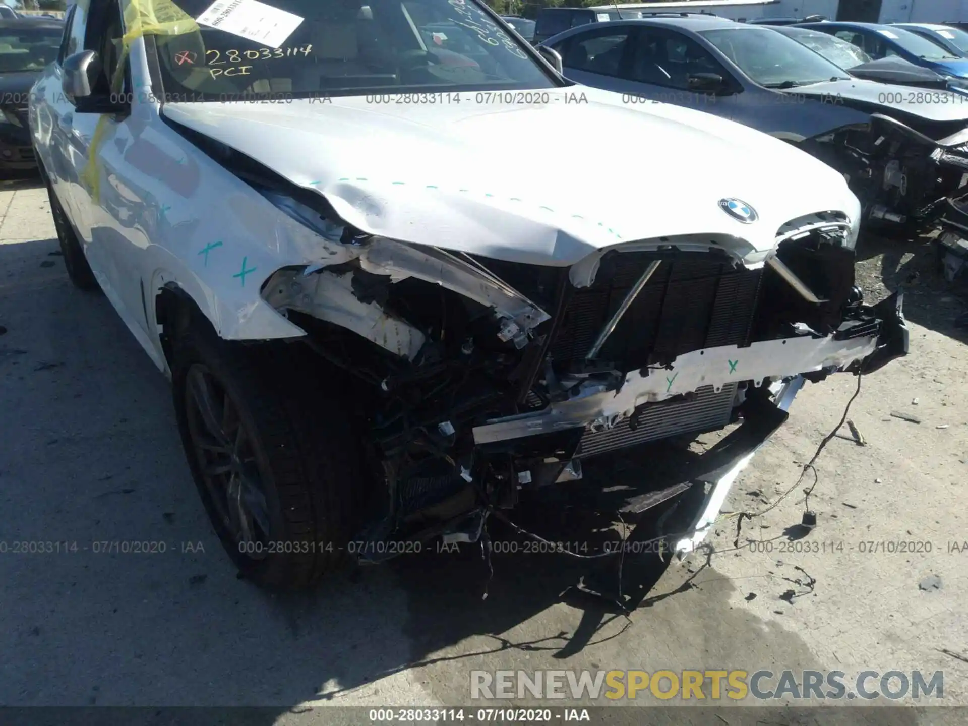6 Photograph of a damaged car 5UX2V5C01L9C41389 BMW X4 2020