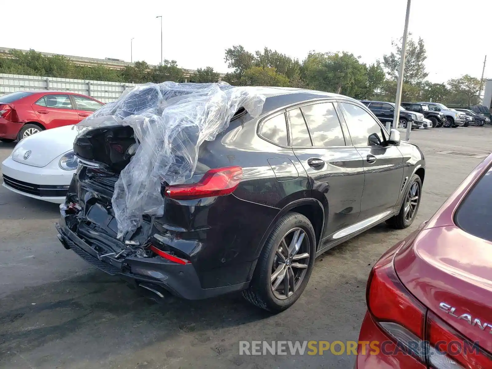 4 Photograph of a damaged car 5UX2V5C02L9B62362 BMW X4 2020