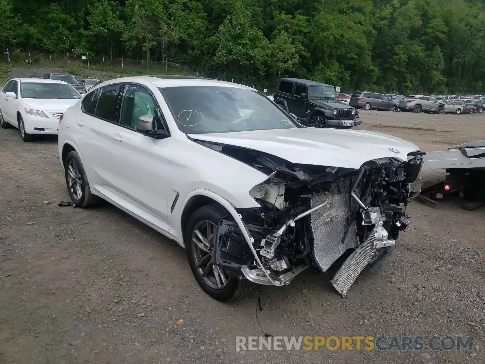 1 Photograph of a damaged car 5UX2V5C09L9B55277 BMW X4 2020