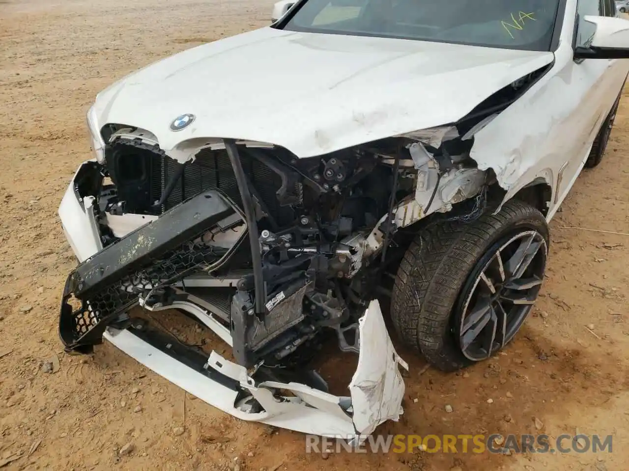 9 Photograph of a damaged car 5YMUJ0C0XLLU67141 BMW X4 2020