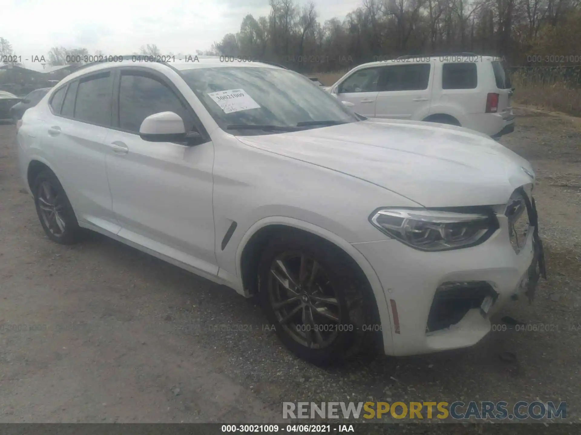 1 Photograph of a damaged car 5UX2V1C01M9E57656 BMW X4 2021