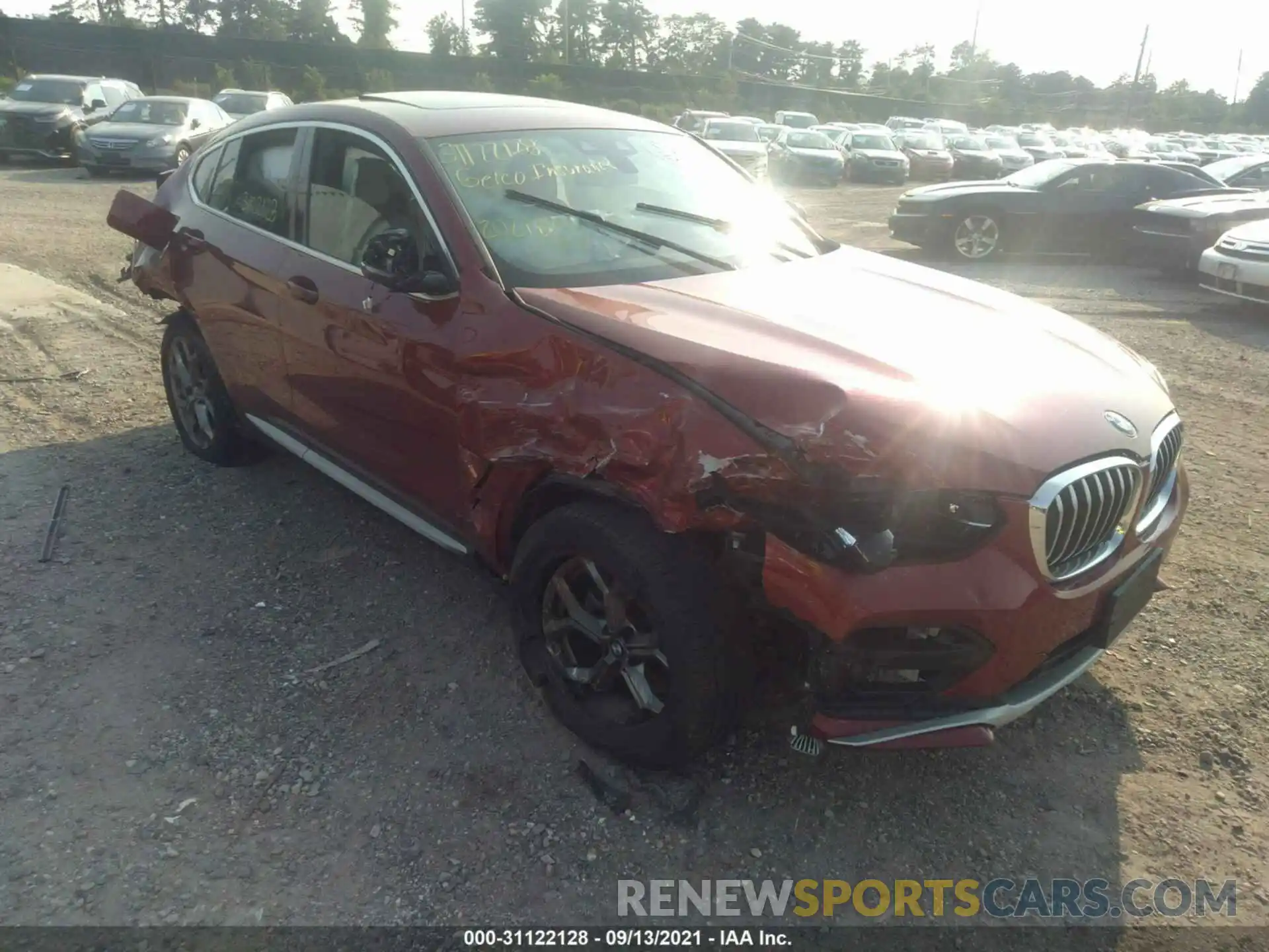 1 Photograph of a damaged car 5UX2V1C01M9E96554 BMW X4 2021