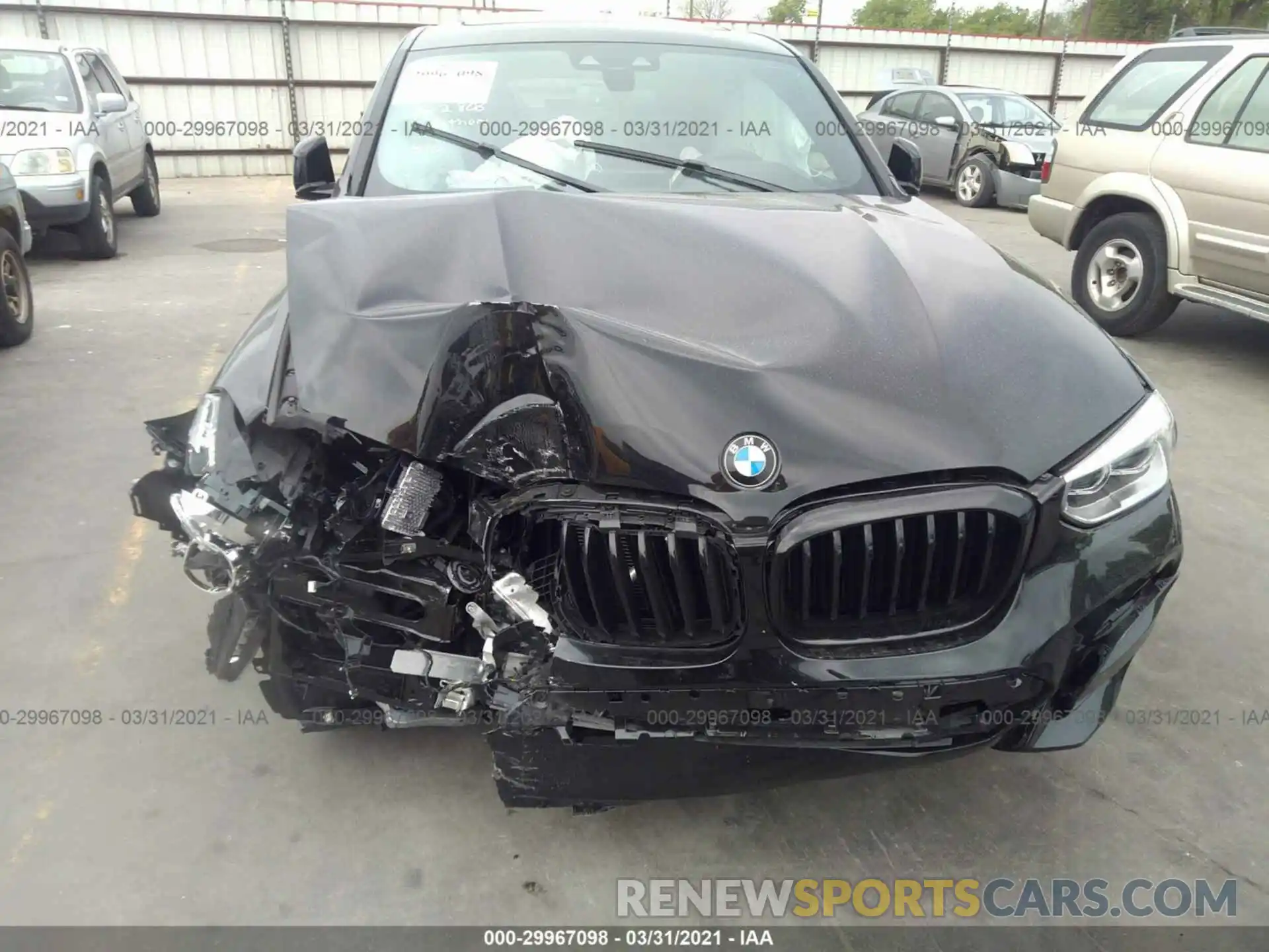 6 Photograph of a damaged car 5UX2V1C01M9F80003 BMW X4 2021