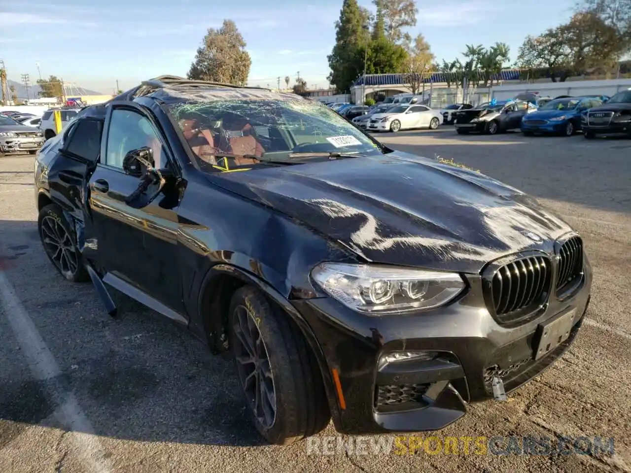 1 Photograph of a damaged car 5UX2V1C02M9F90894 BMW X4 2021