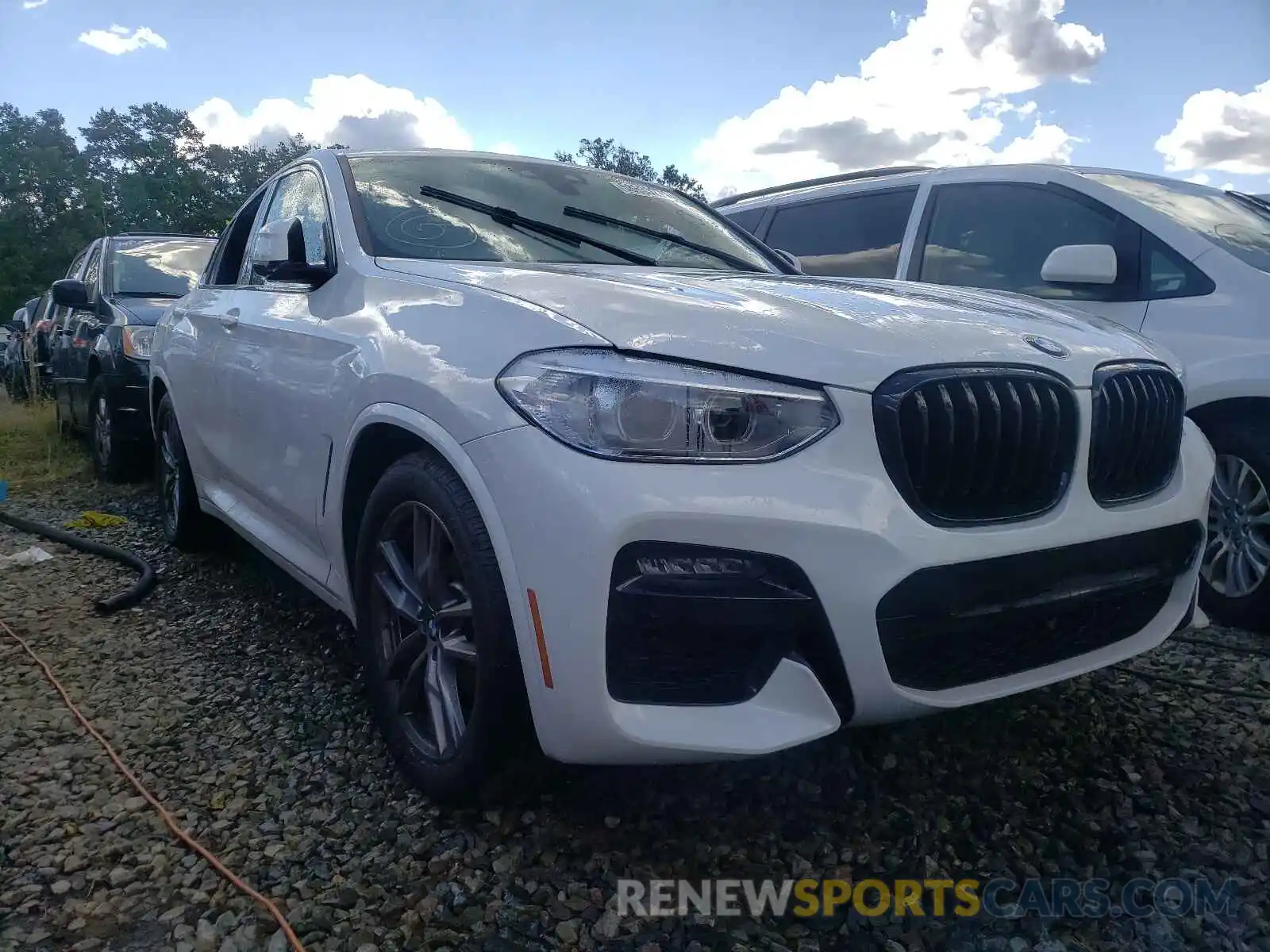 1 Photograph of a damaged car 5UX2V1C05M9F02209 BMW X4 2021