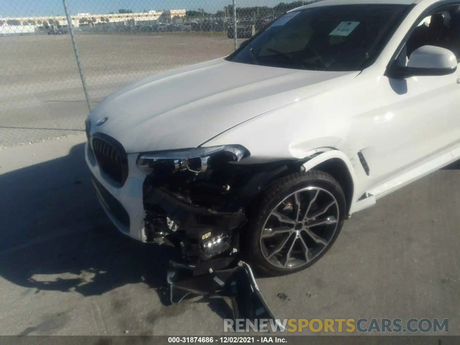 6 Photograph of a damaged car 5UX2V1C05M9H34129 BMW X4 2021