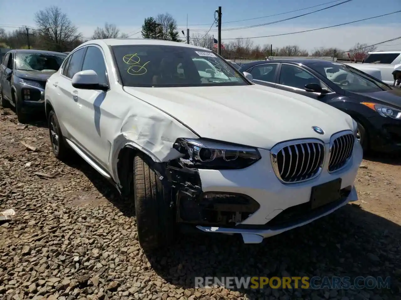 1 Photograph of a damaged car 5UX2V1C06M9G99519 BMW X4 2021