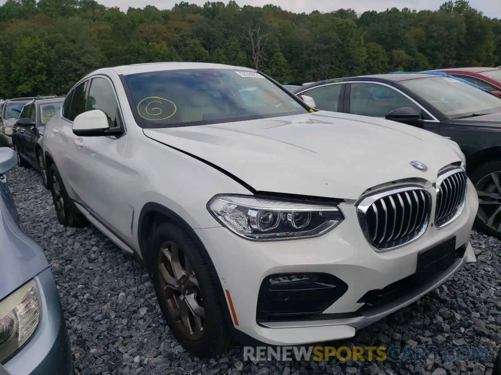 1 Photograph of a damaged car 5UX2V1C07M9F21005 BMW X4 2021