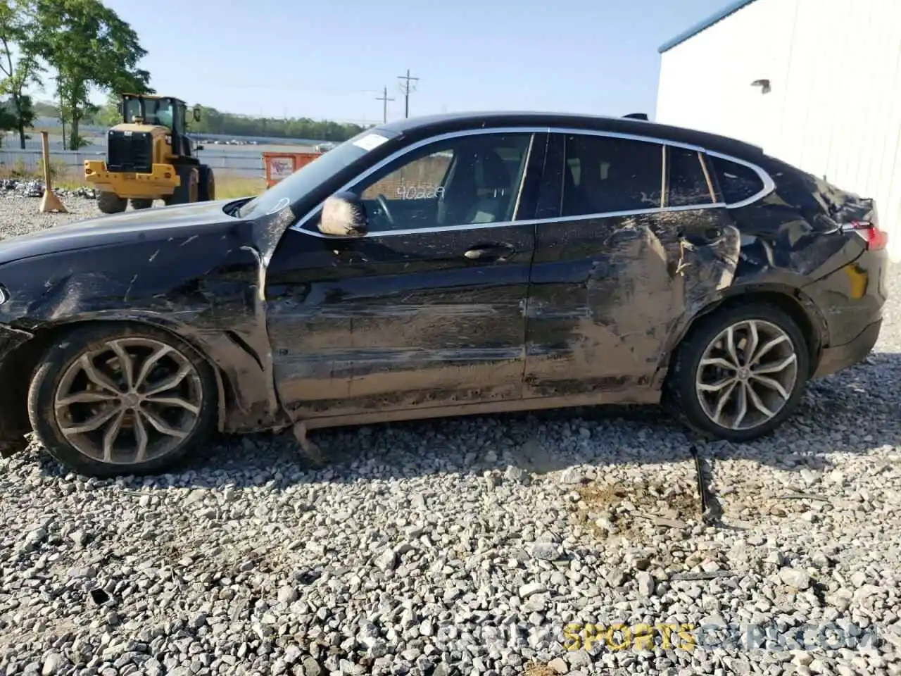 9 Photograph of a damaged car 5UX2V1C08M9D96693 BMW X4 2021