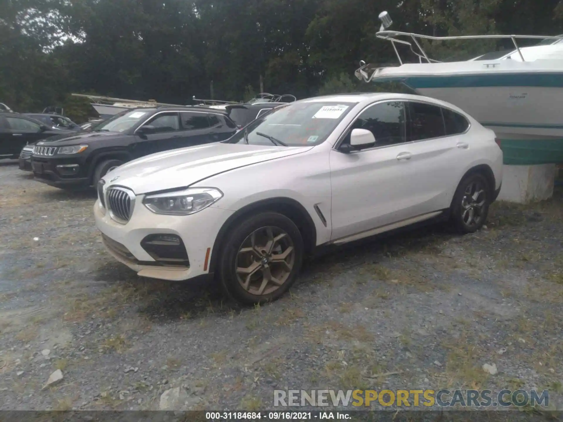 2 Photograph of a damaged car 5UX2V1C09M9G26144 BMW X4 2021