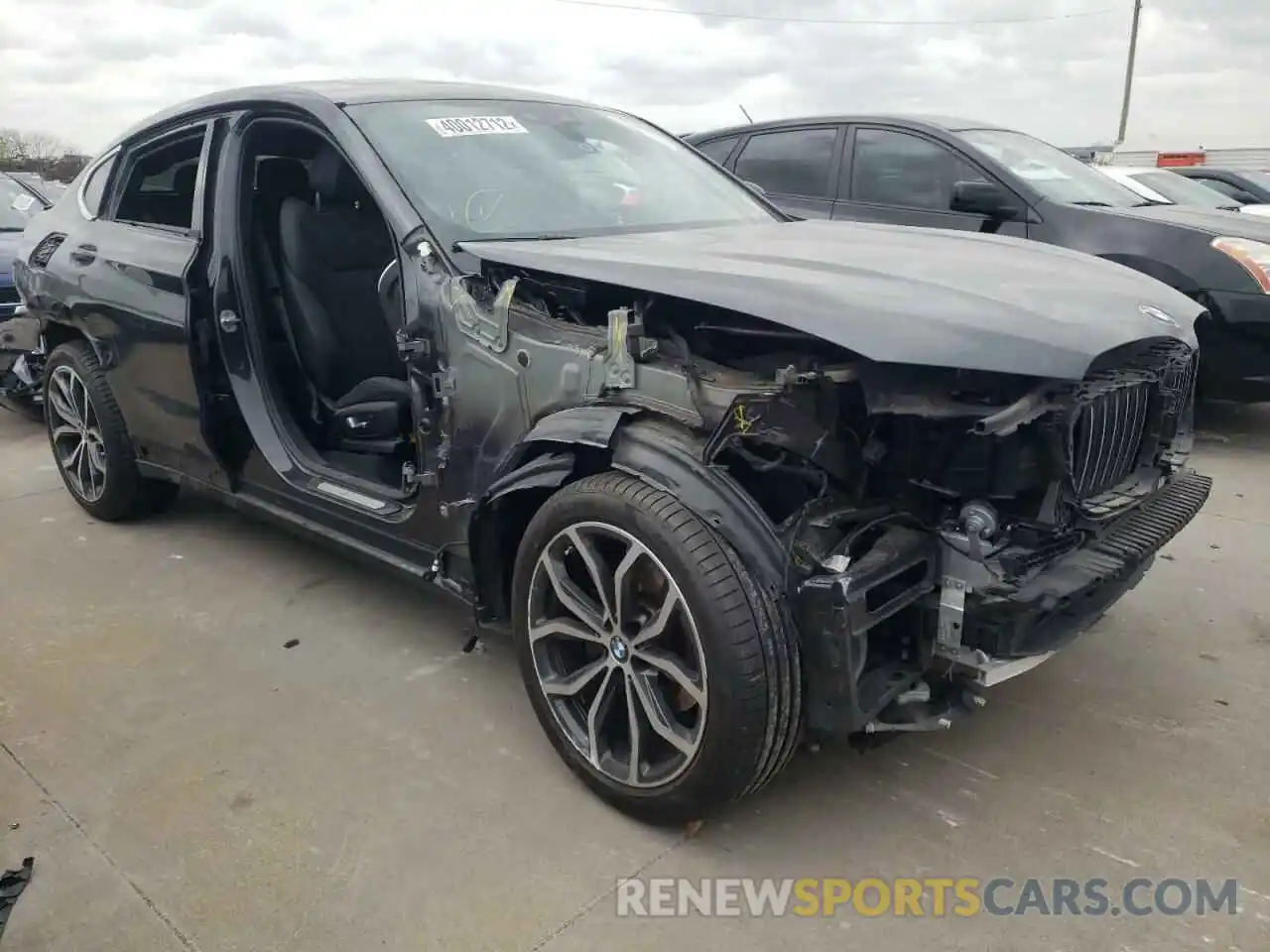 1 Photograph of a damaged car 5UX2V1C0XM9E00209 BMW X4 2021