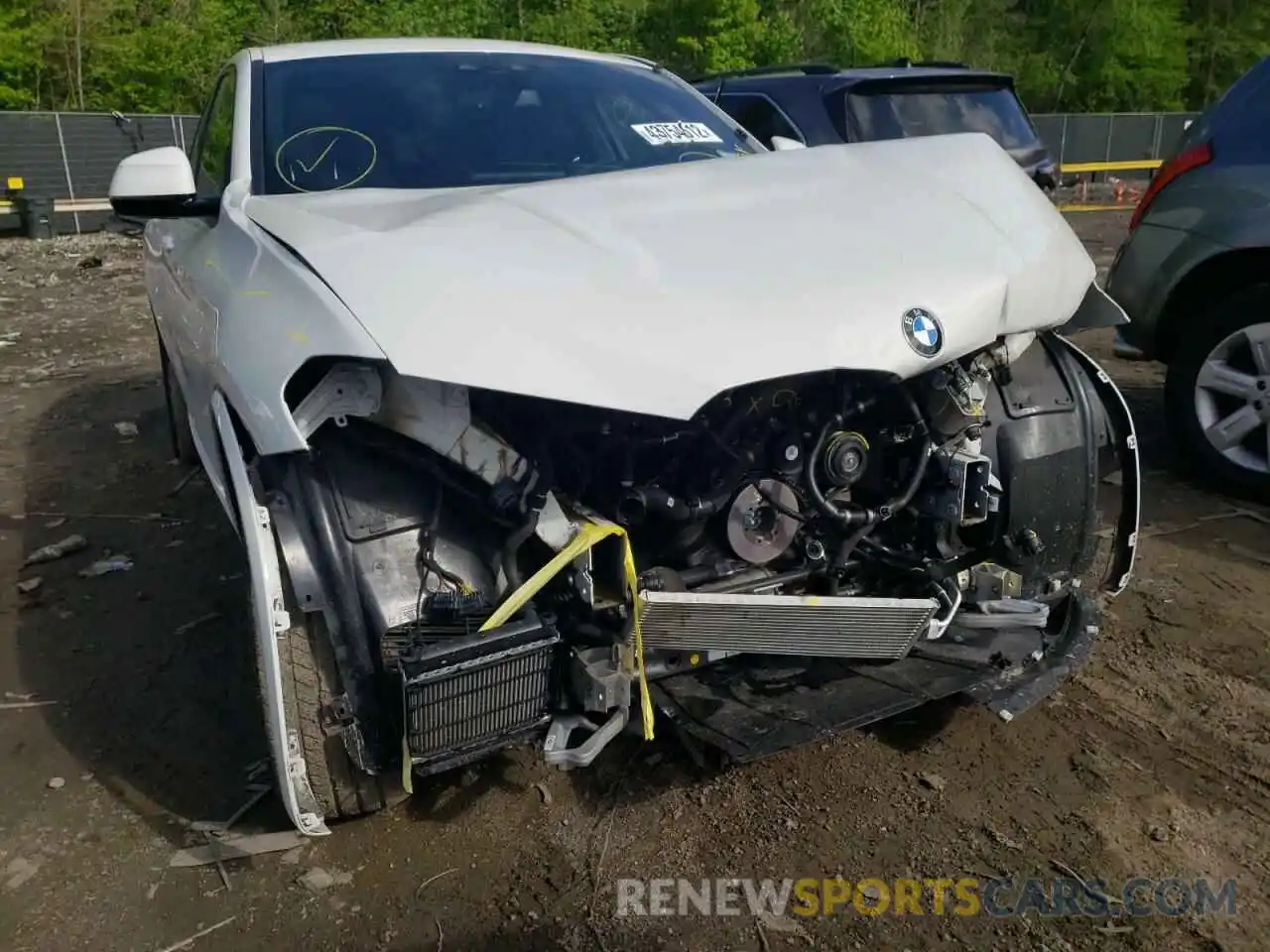 9 Photograph of a damaged car 5UX2V5C01M9E47698 BMW X4 2021