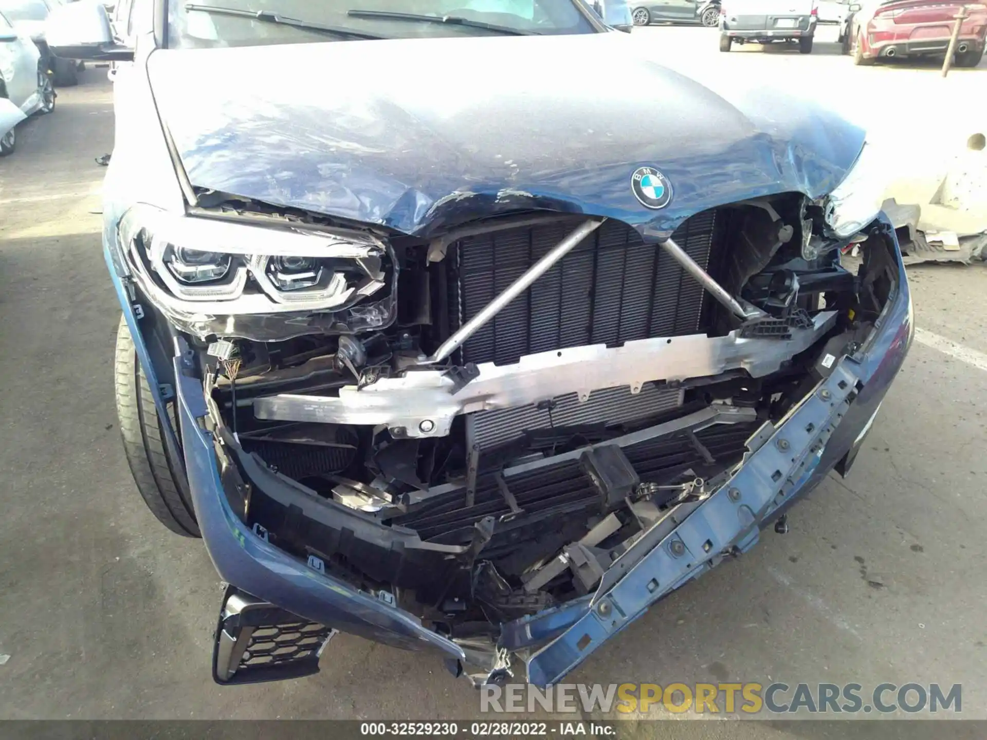 6 Photograph of a damaged car 5UX2V5C01M9E77610 BMW X4 2021