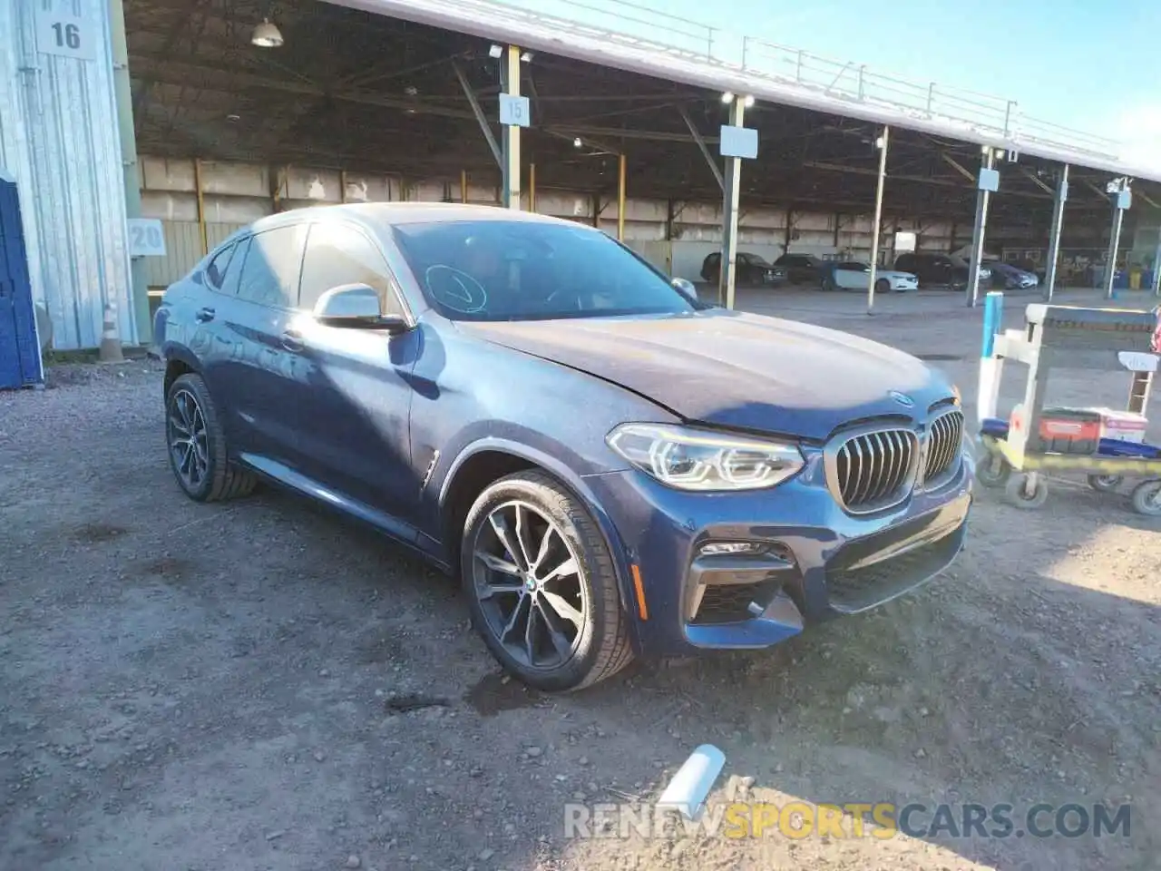 1 Photograph of a damaged car 5UX2V5C01M9H22633 BMW X4 2021