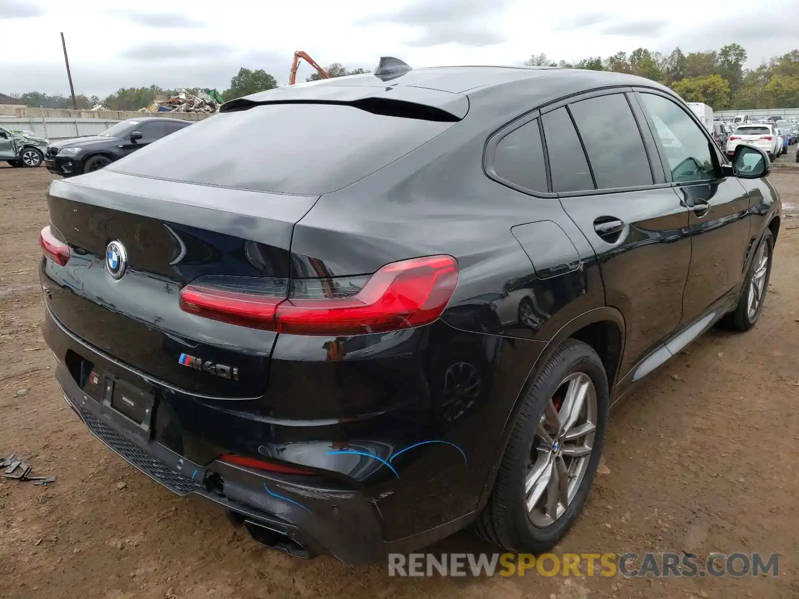 4 Photograph of a damaged car 5UX2V5C02M9G30947 BMW X4 2021