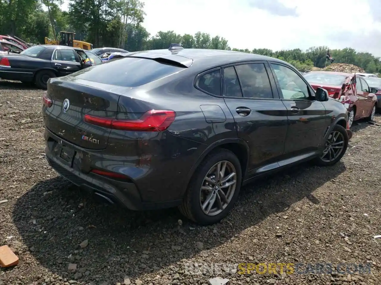 4 Photograph of a damaged car 5UX2V5C06M9F47991 BMW X4 2021