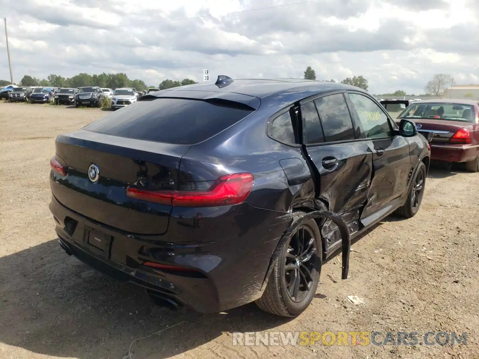 4 Photograph of a damaged car 5UX2V5C07M9E05049 BMW X4 2021