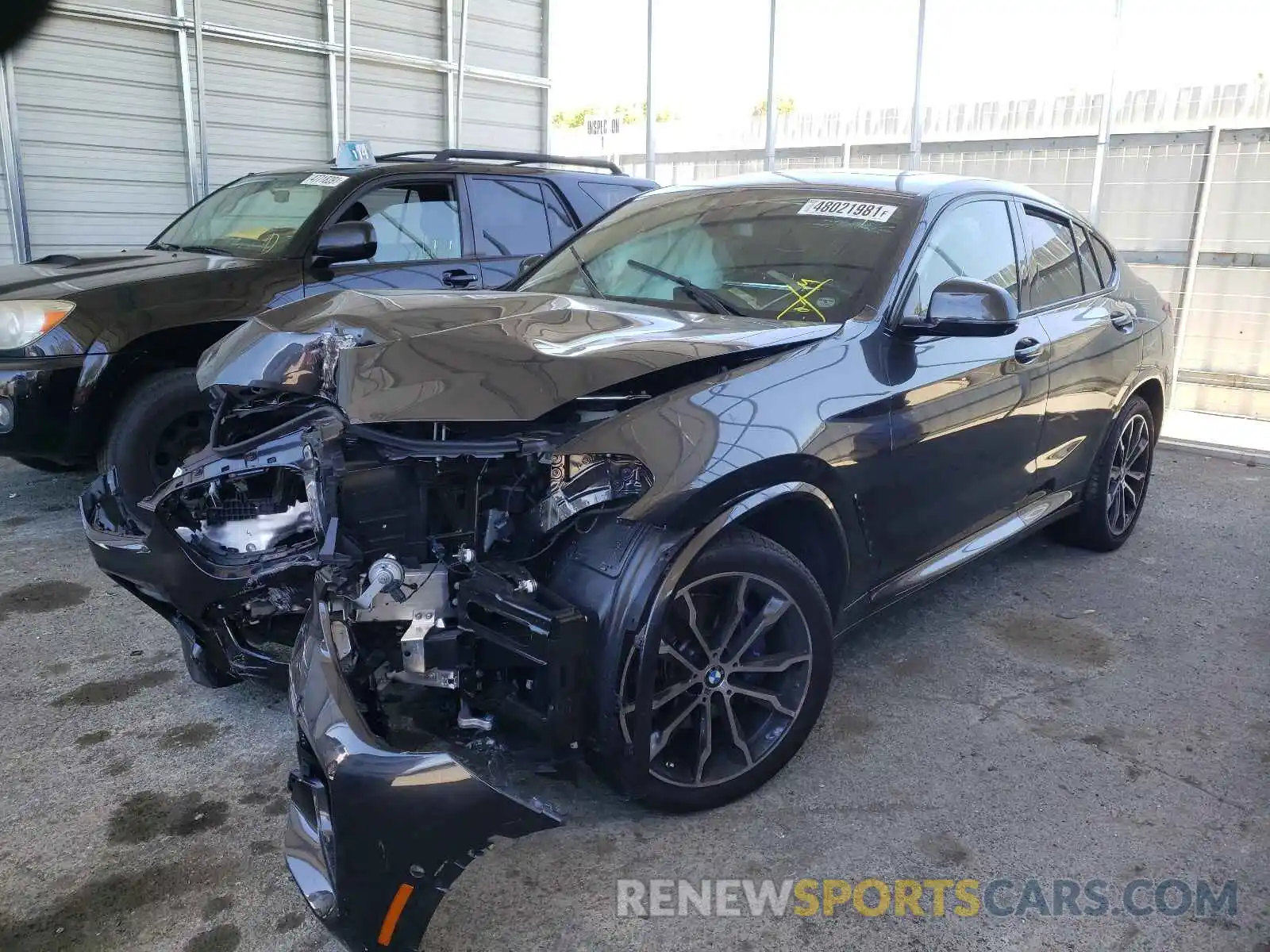 2 Photograph of a damaged car 5UX2V5C07M9F18497 BMW X4 2021