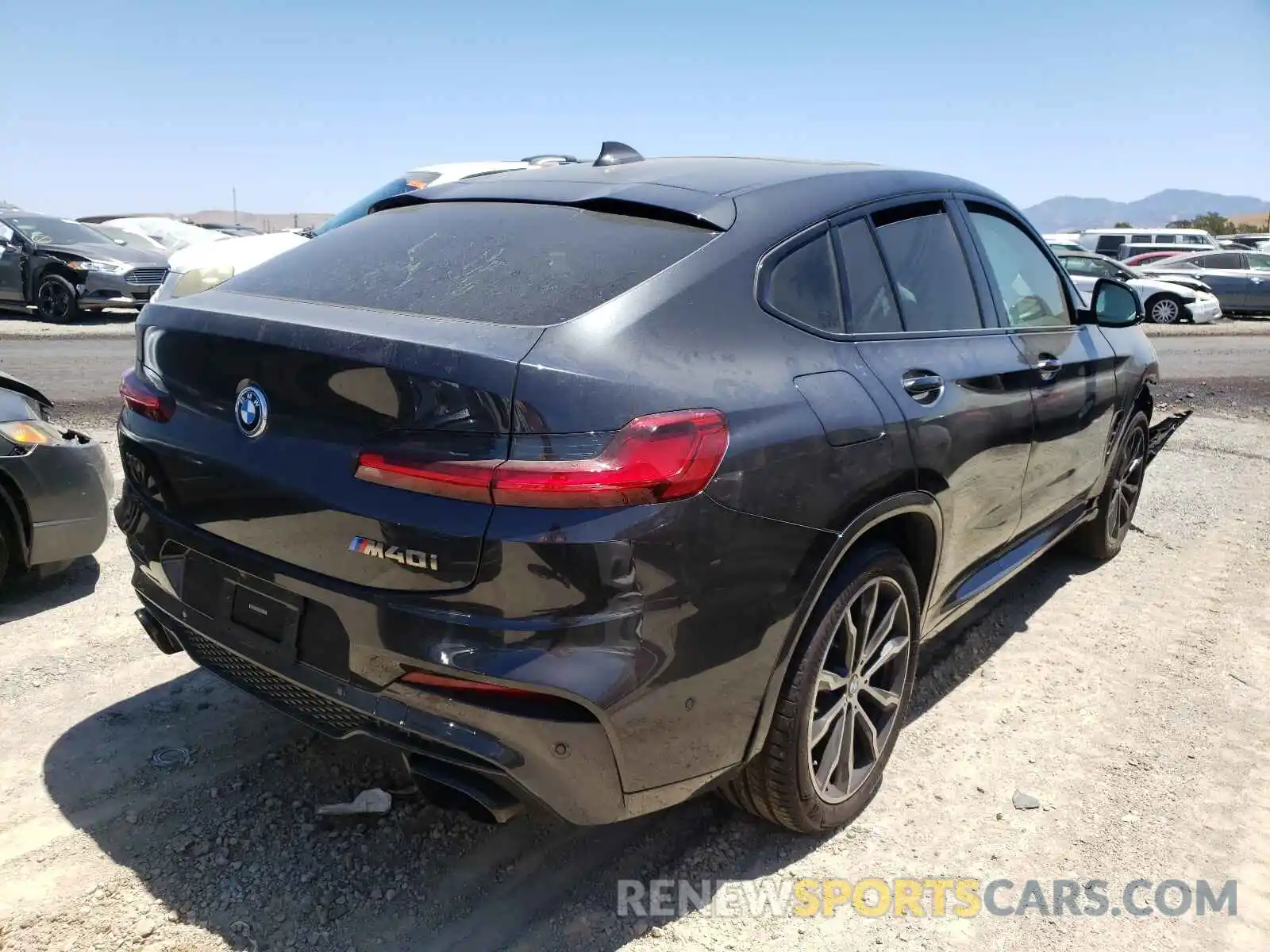 4 Photograph of a damaged car 5UX2V5C07M9F18497 BMW X4 2021