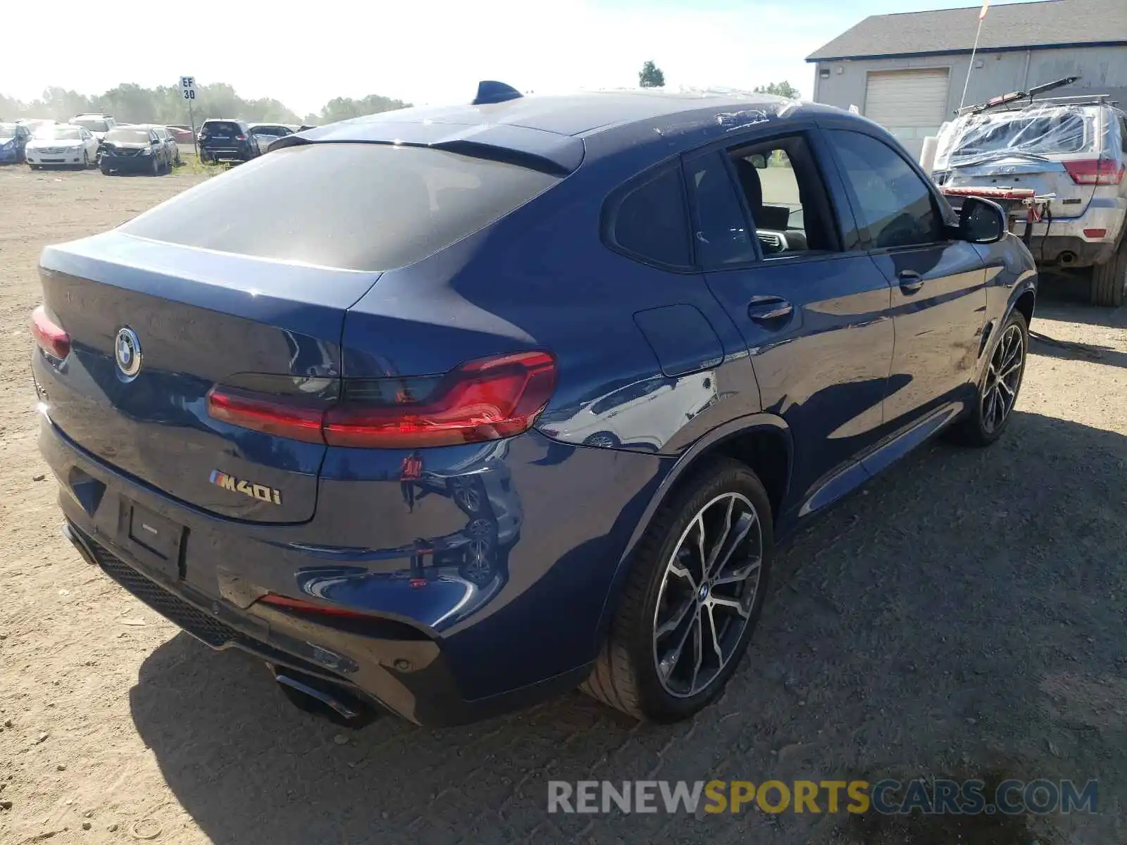 4 Photograph of a damaged car 5UX2V5C08M9E06999 BMW X4 2021