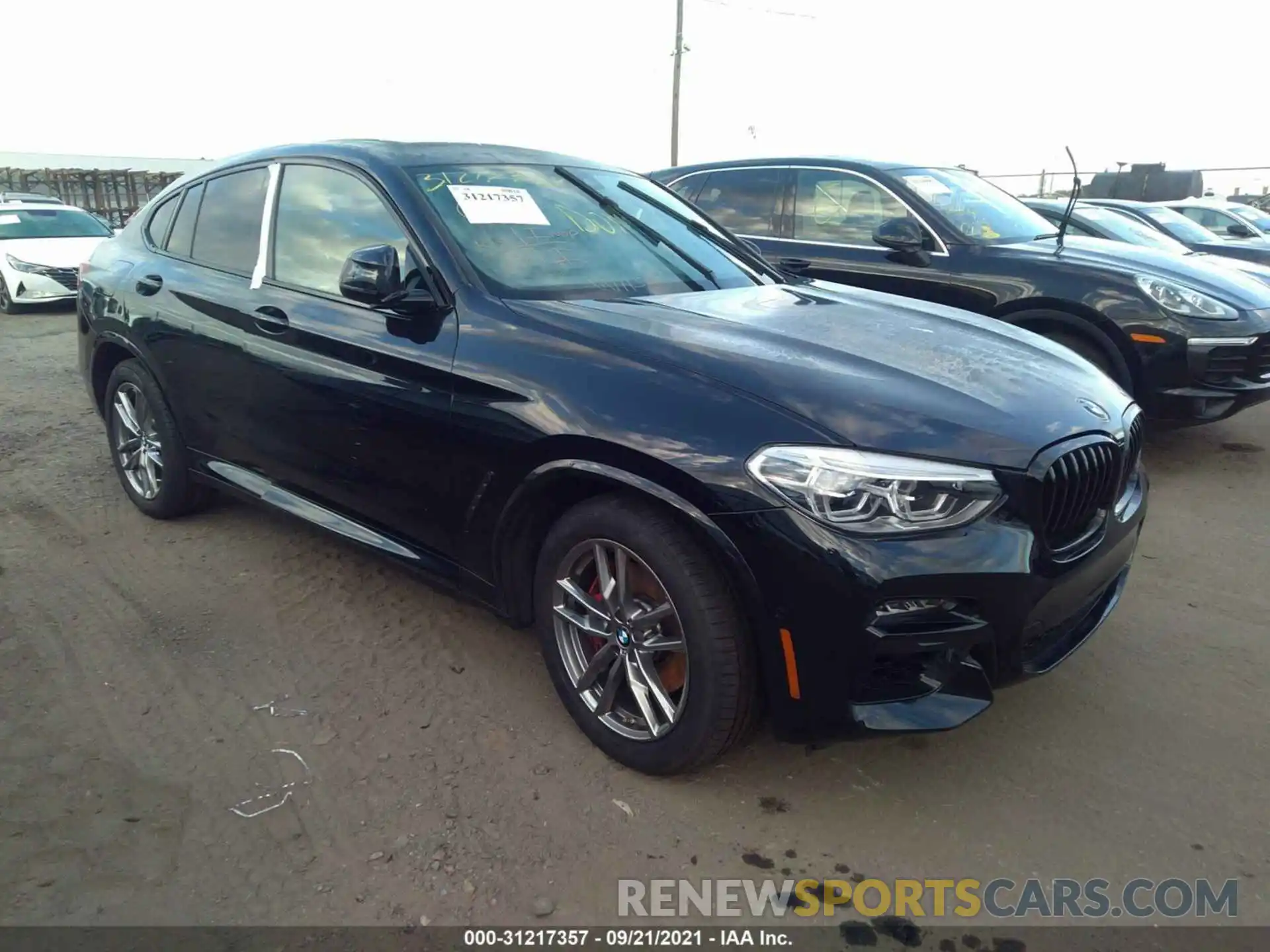 1 Photograph of a damaged car 5UX2V5C09M9D84575 BMW X4 2021