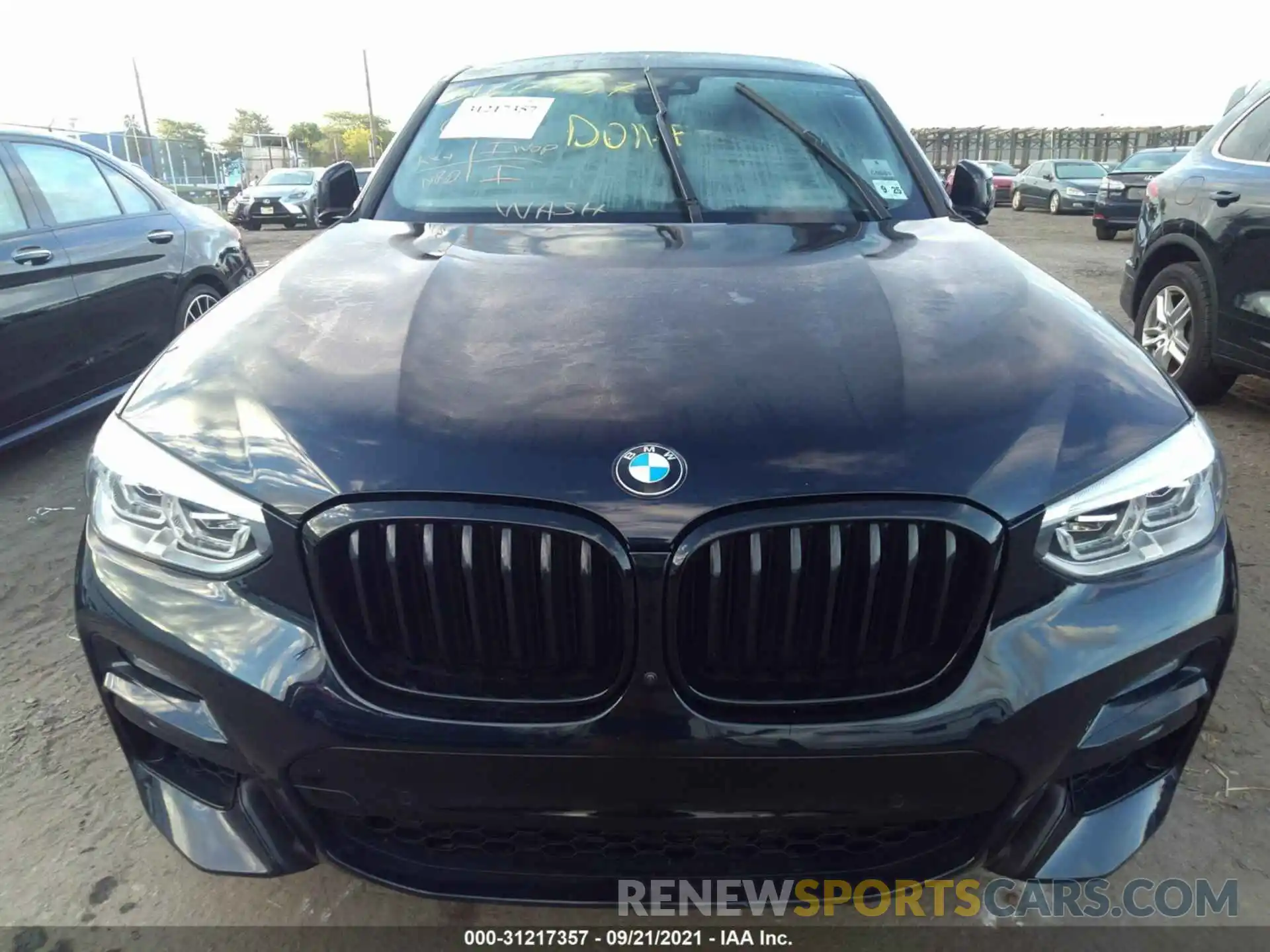 6 Photograph of a damaged car 5UX2V5C09M9D84575 BMW X4 2021