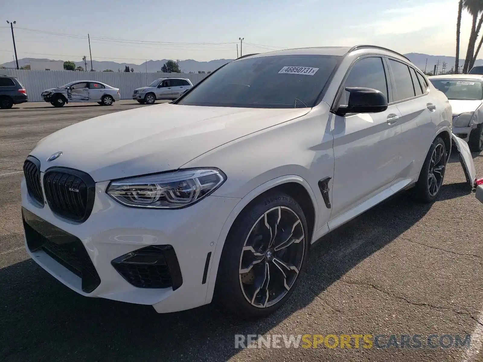 2 Photograph of a damaged car 5YMUJ0C01M9F33979 BMW X4 2021