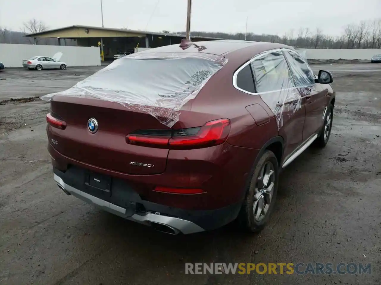 4 Photograph of a damaged car 5UX33DT05N9K27094 BMW X4 2022