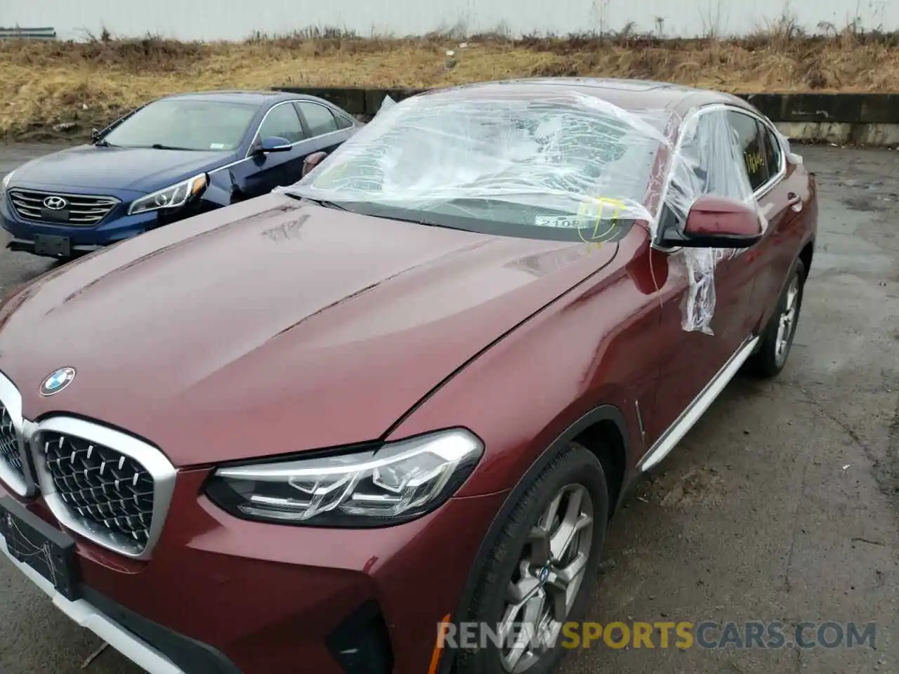 9 Photograph of a damaged car 5UX33DT05N9K27094 BMW X4 2022