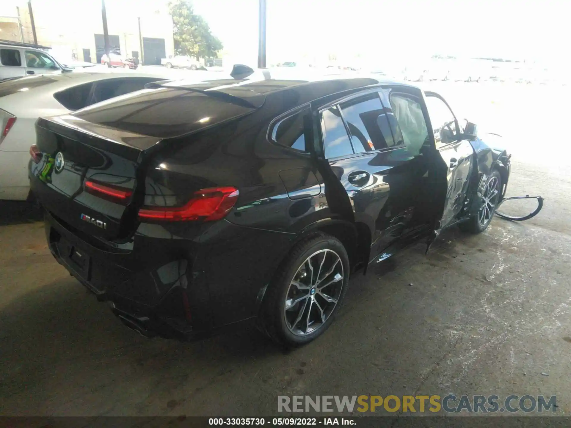 4 Photograph of a damaged car 5UX43DT04N9J61769 BMW X4 2022