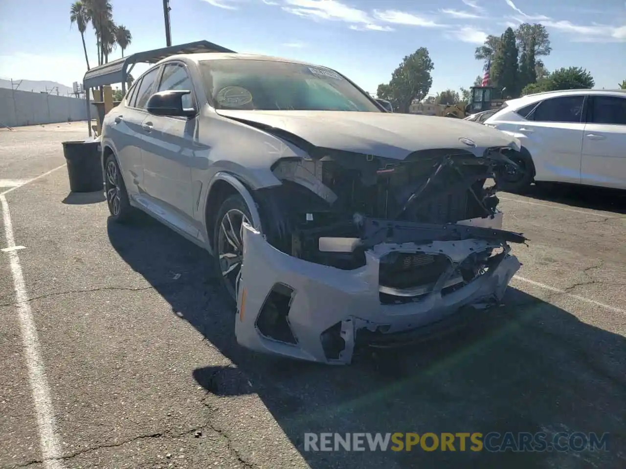 1 Photograph of a damaged car 5UX43DT04N9K97349 BMW X4 2022