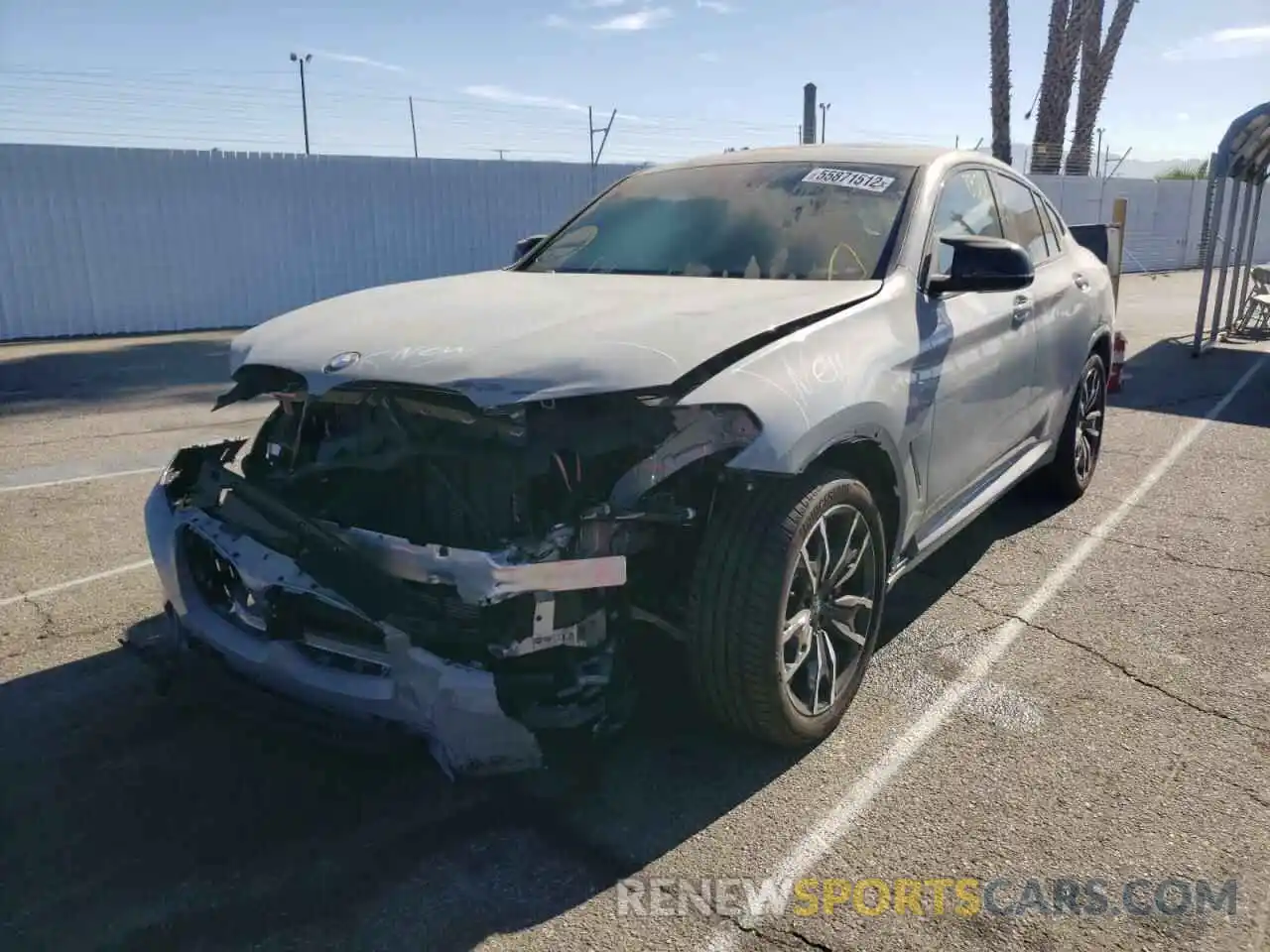 2 Photograph of a damaged car 5UX43DT04N9K97349 BMW X4 2022