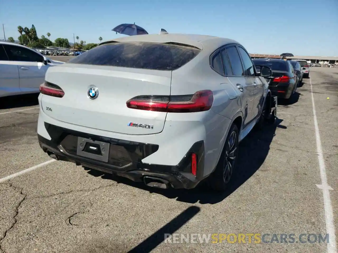 4 Photograph of a damaged car 5UX43DT04N9K97349 BMW X4 2022