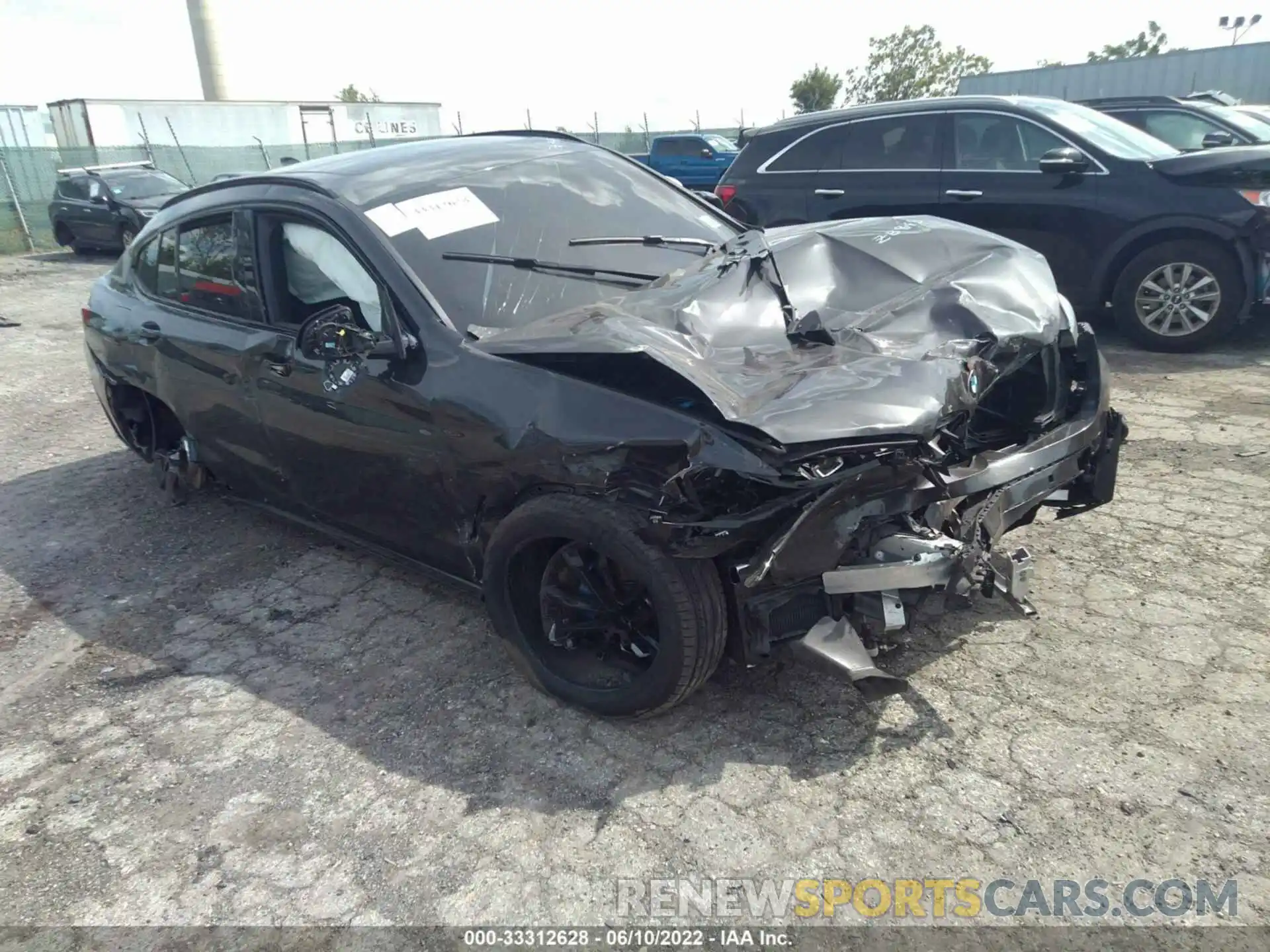 1 Photograph of a damaged car 5UX43DT09N9K60992 BMW X4 2022