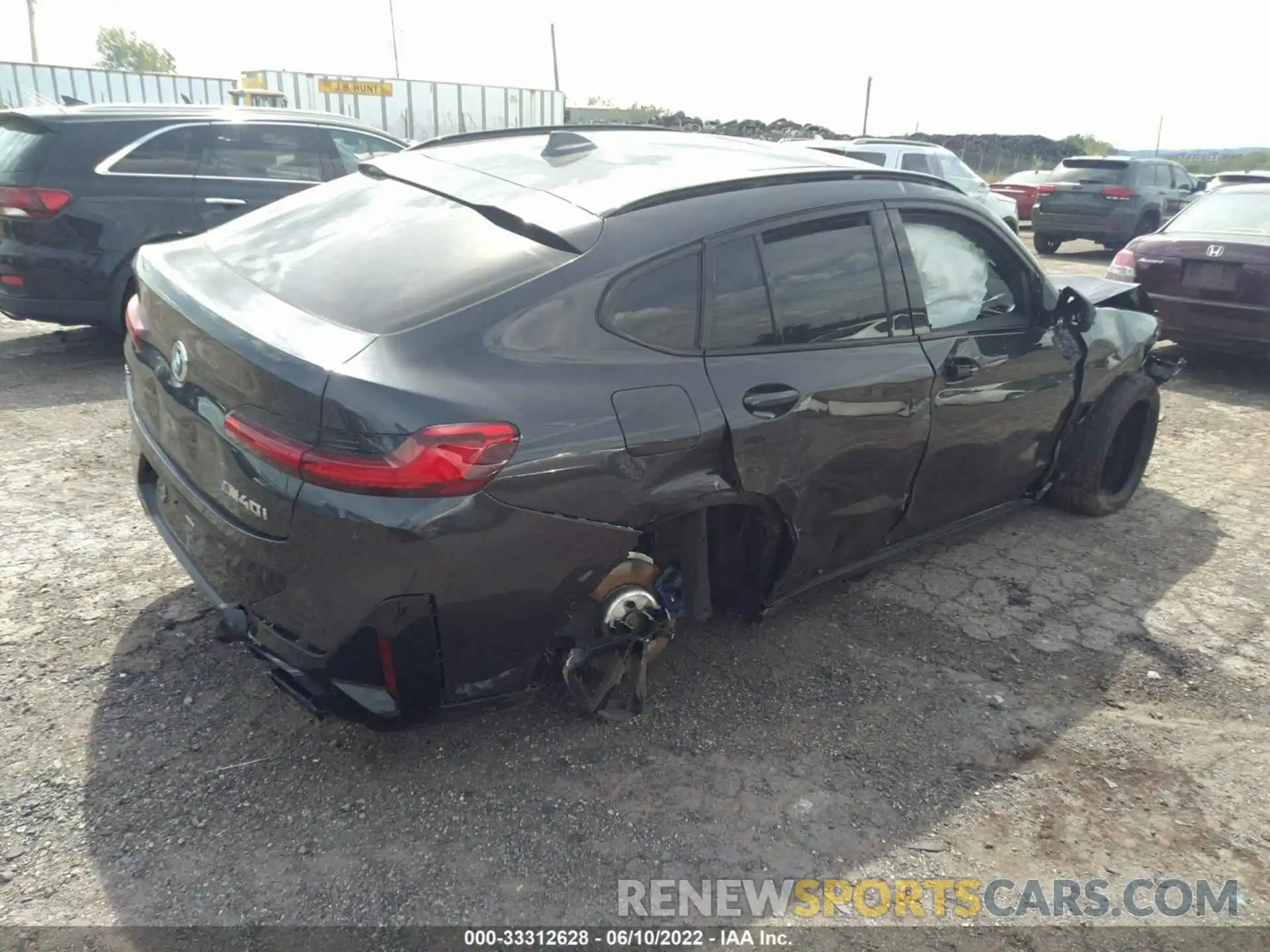 4 Photograph of a damaged car 5UX43DT09N9K60992 BMW X4 2022