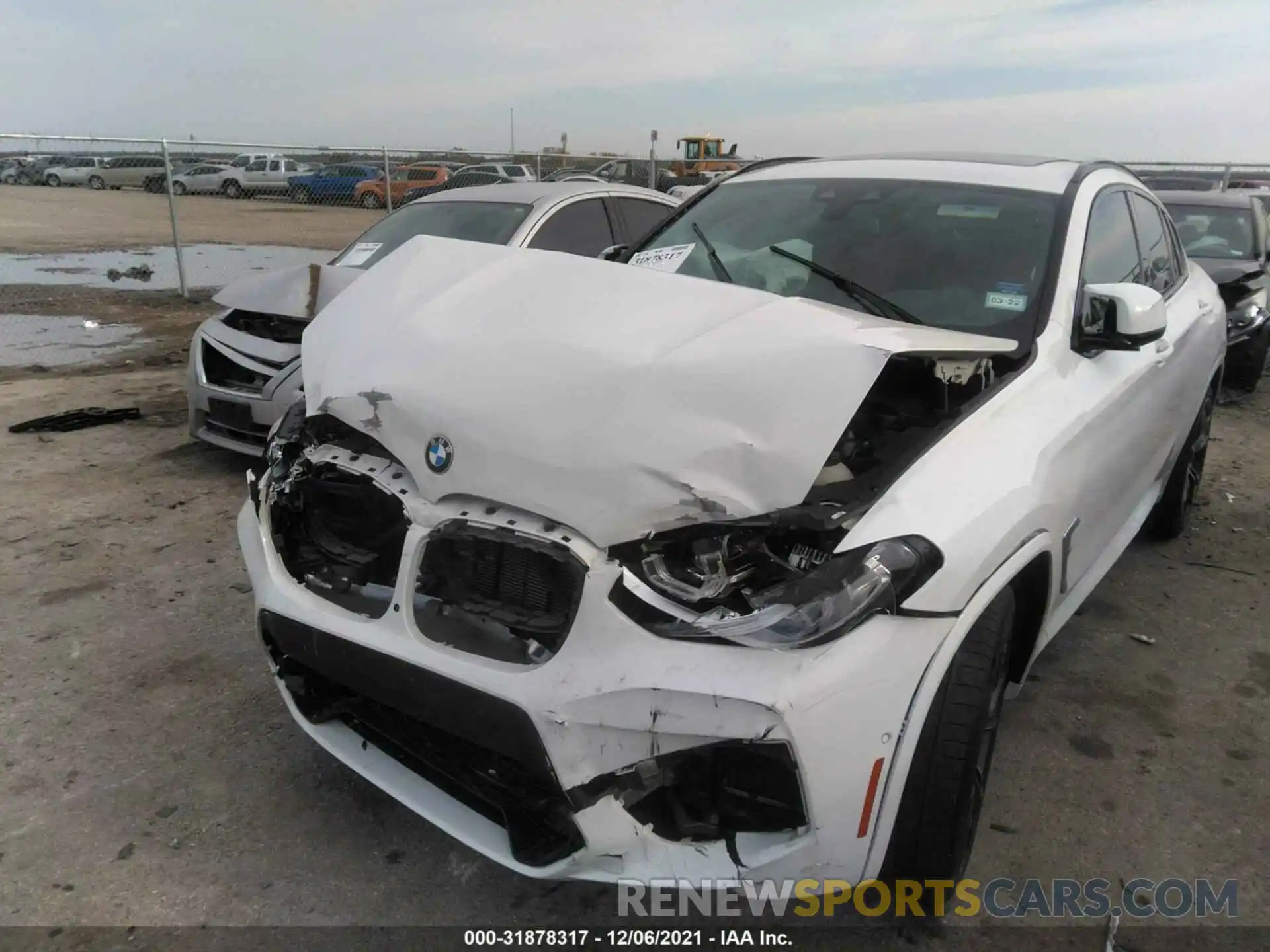 6 Photograph of a damaged car 5YMUJ0C03LLU67062 BMW X4 M 2020