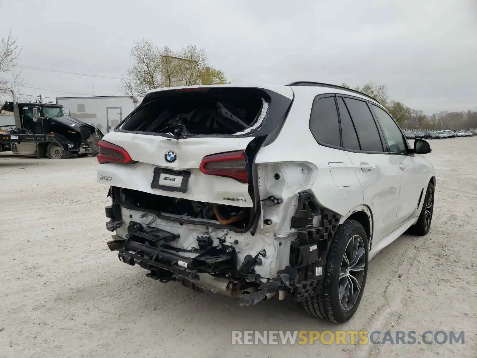 4 Photograph of a damaged car 5UXJU2C55KLN65002 BMW X5 2019