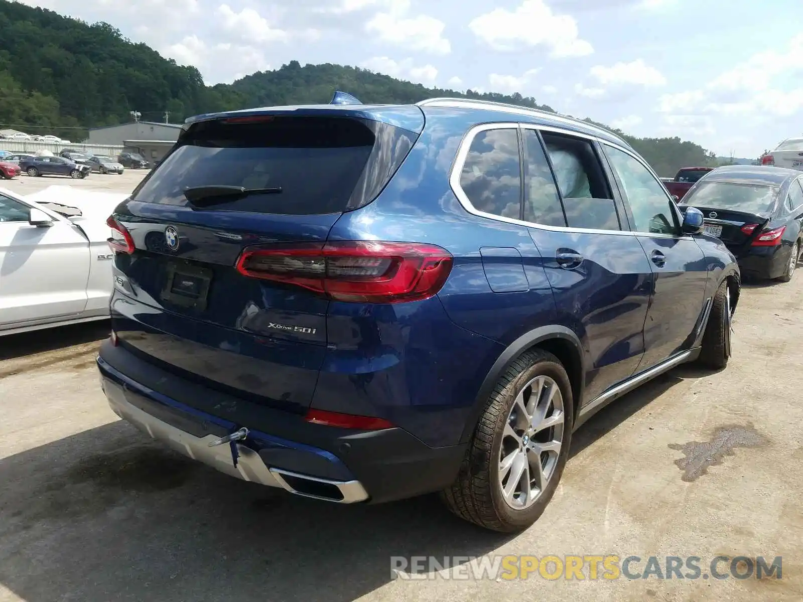 4 Photograph of a damaged car 5UXJU2C56KLN66501 BMW X5 2019