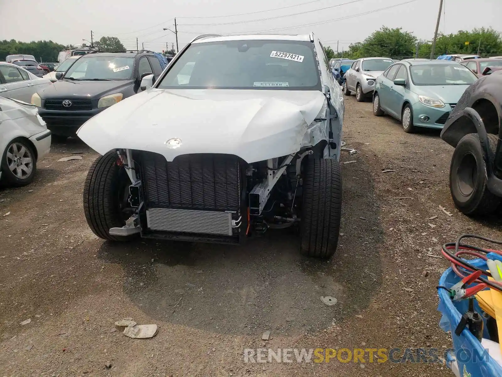 9 Photograph of a damaged car 5UXCR6C00M9F56569 BMW X5 2021