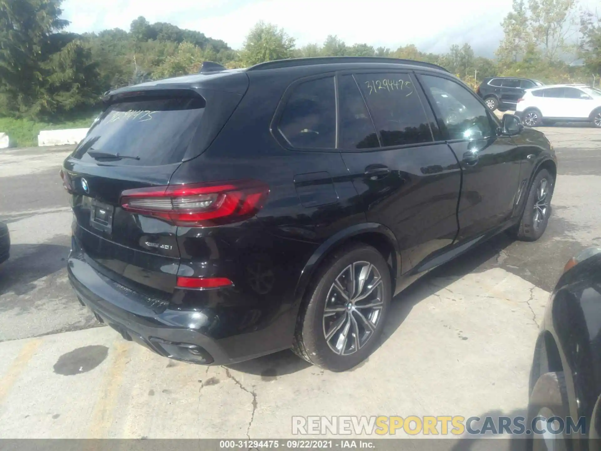 4 Photograph of a damaged car 5UXCR6C06M9H01520 BMW X5 2021