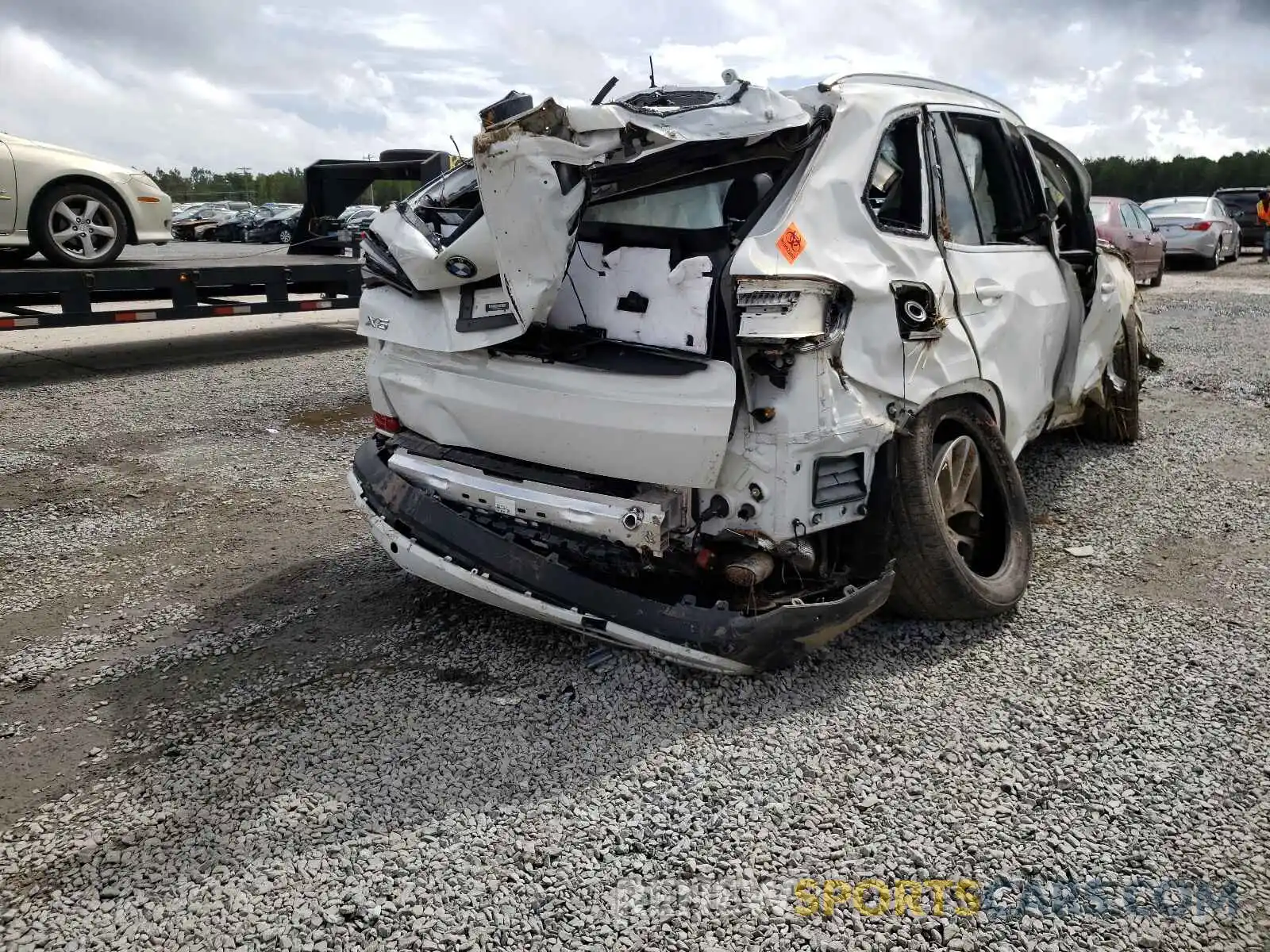 4 Photograph of a damaged car 5UXCR6C08M9H11370 BMW X5 2021