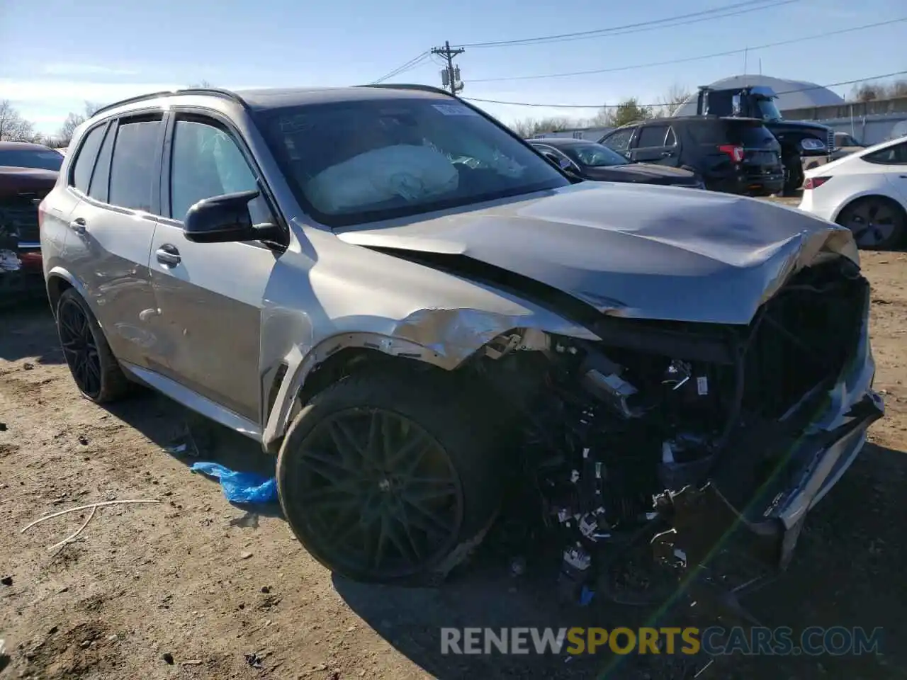 1 Photograph of a damaged car 5YMJU0C03M9D83738 BMW X5 2021