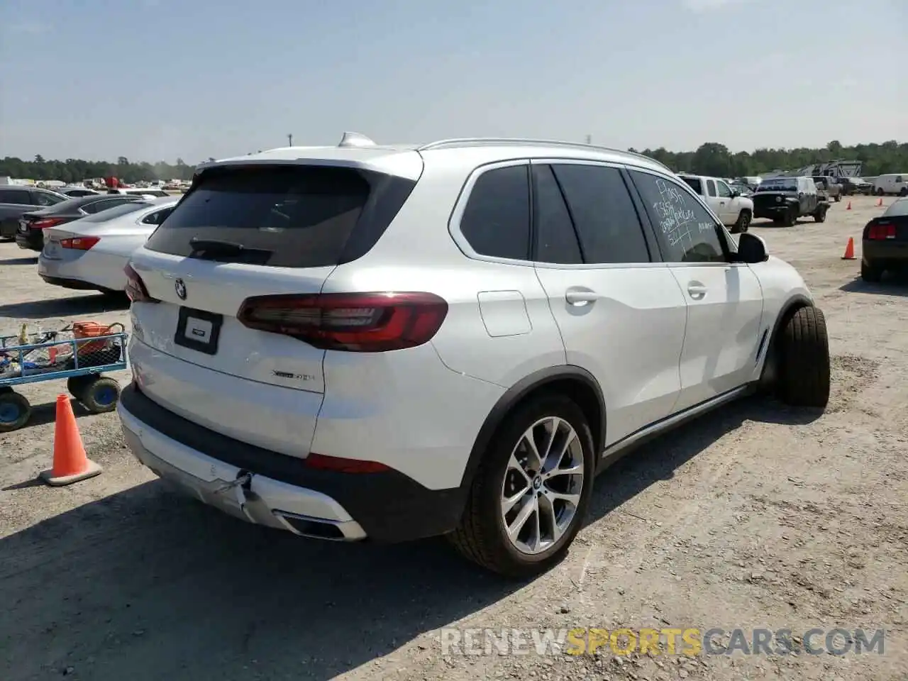 4 Photograph of a damaged car 5UXCR6C05N9J82782 BMW X5 2022