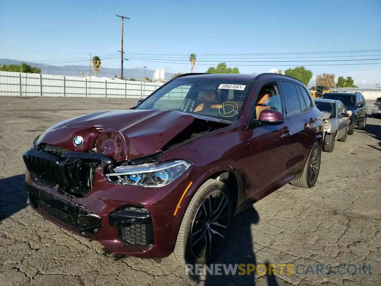 2 Photograph of a damaged car 5UXJU4C0XN9J77572 BMW X5 2022