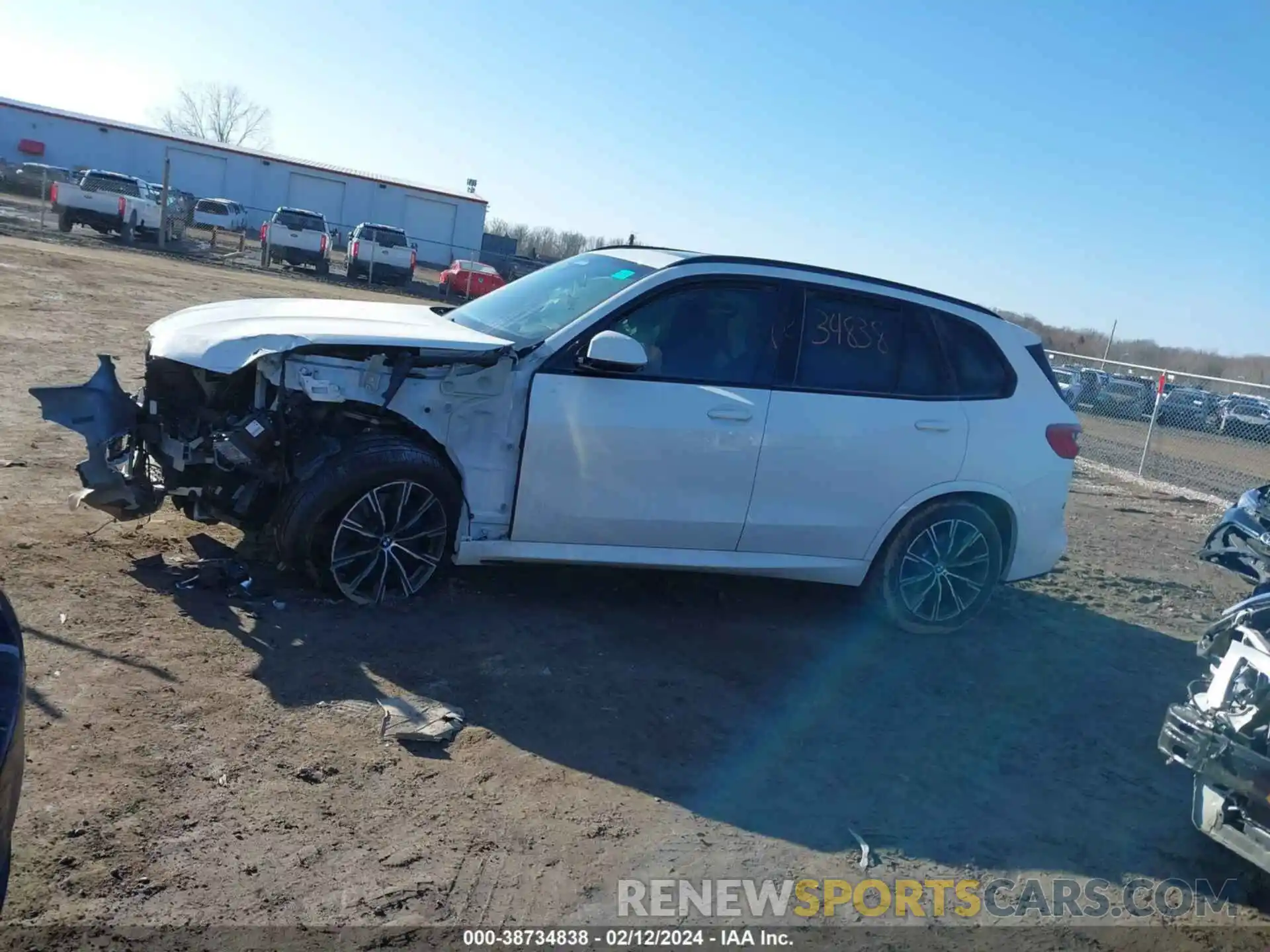 14 Photograph of a damaged car 5UXCR6C07P9P03214 BMW X5 2023