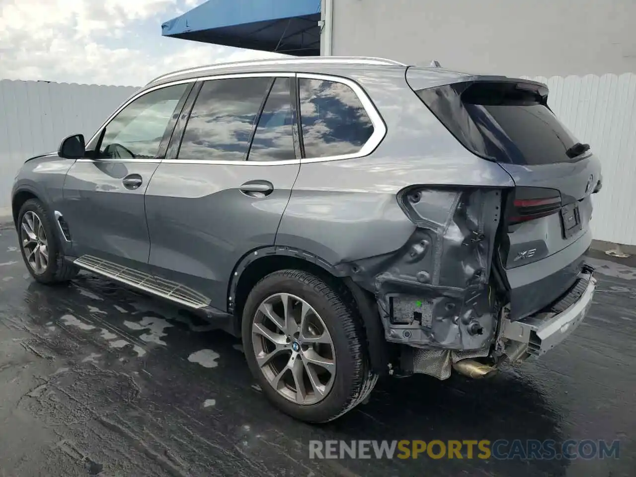 2 Photograph of a damaged car 5UX23EU02R9T34545 BMW X5 2024