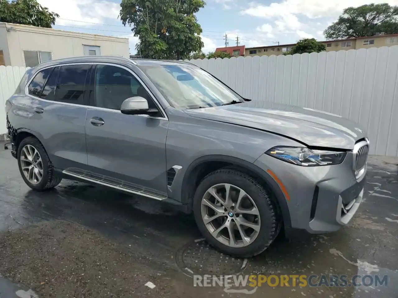 4 Photograph of a damaged car 5UX23EU02R9T34545 BMW X5 2024