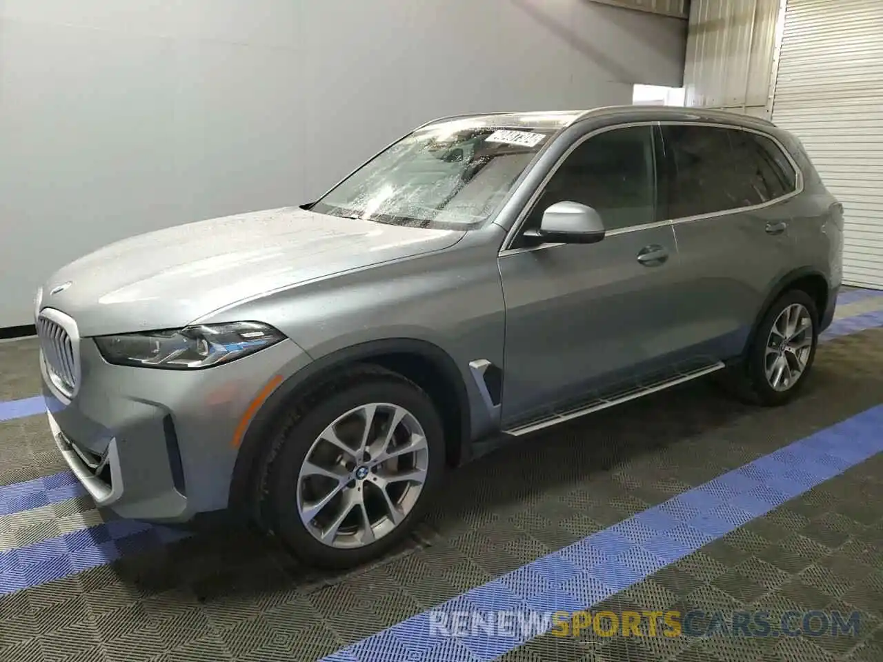 1 Photograph of a damaged car 5UX23EU09R9T34817 BMW X5 2024