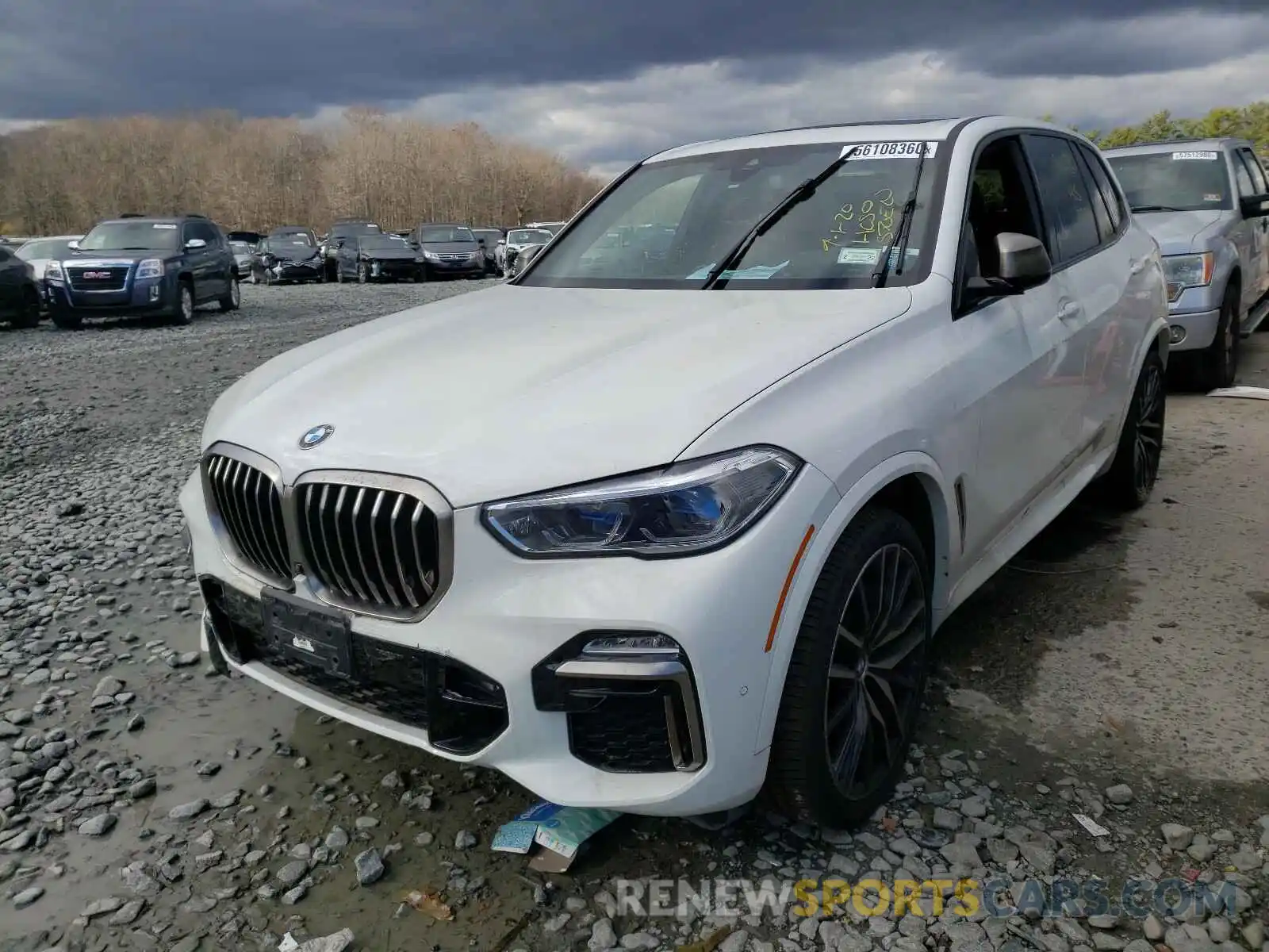 2 Photograph of a damaged car 5UXJU4C05LLE45642 BMW X5 M50I 2020